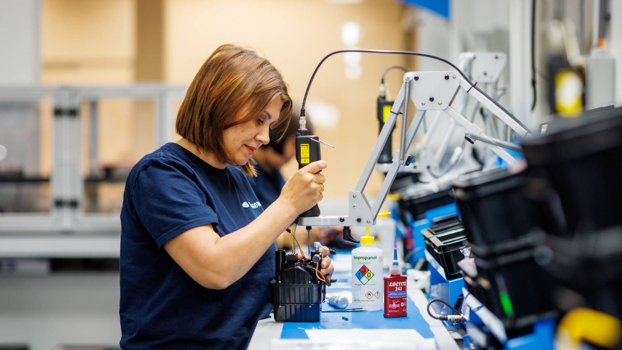 female_technician_production_line_manufacturing